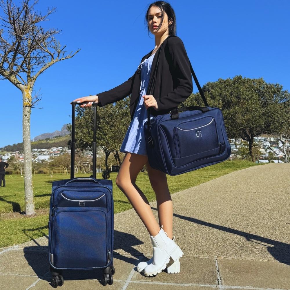 Lifestyle image of the Monaco luggage set in an outdoor setting, showcasing its sleek profile, durable build, and refined design suited for stylish travel in nature or urban escapes