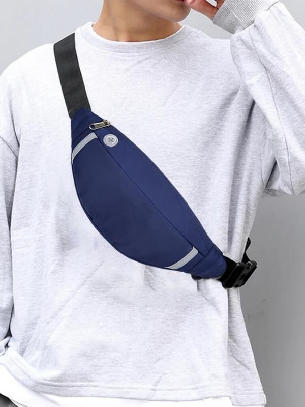 Lifestyle image of the Moon Bag worn across the body in an everyday setting, highlighting its curved silhouette, sleek profile, and hands-free design ideal for casual travel or urban movement