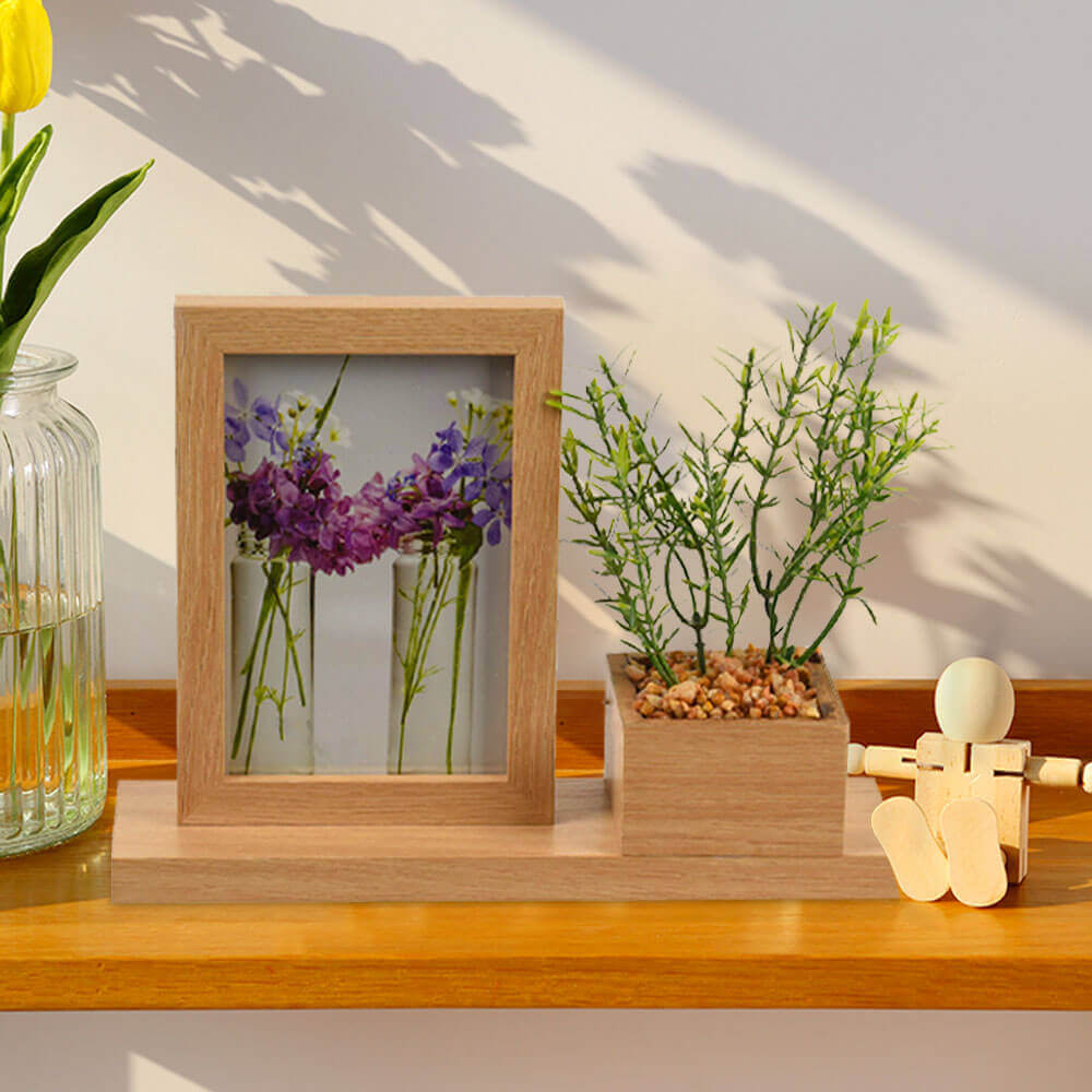 Cadre photo naturel avec plante artificielle sur étagère