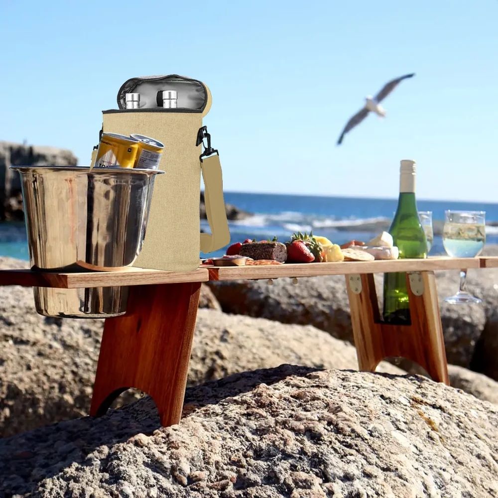 Lifestyle image of two insulated wine cooler bags in use outdoors, showcasing their stylish design and practical features—ideal for picnics, gatherings, and keeping wine perfectly chilled on the go